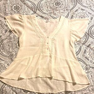 Cream blouse. Short sleeved. Size small.